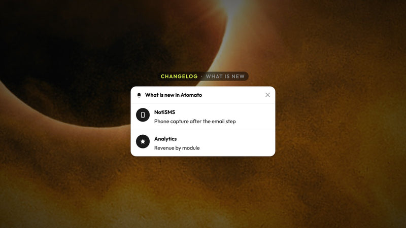 Atomato changelog example: a feed listing recent product updates including NotiSMS and analytics, over a photo of an eclipse behind golden clouds