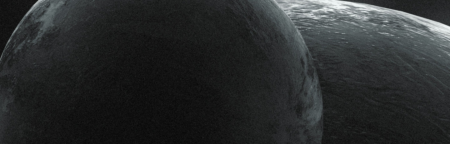 Two grey moons overlapping in darkness