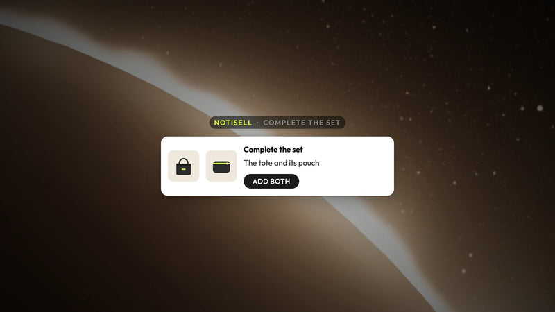 Atomato NotiSell campaign example: a complete the set message pairing a tote with its pouch and an Add both button, over a photo of a glowing ring edge with stars