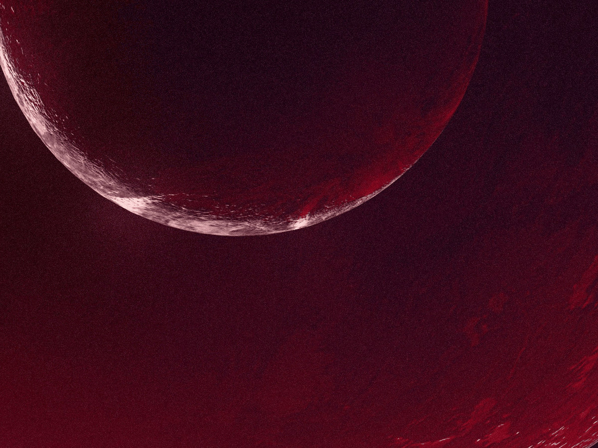 A crimson crescent on a dark red field